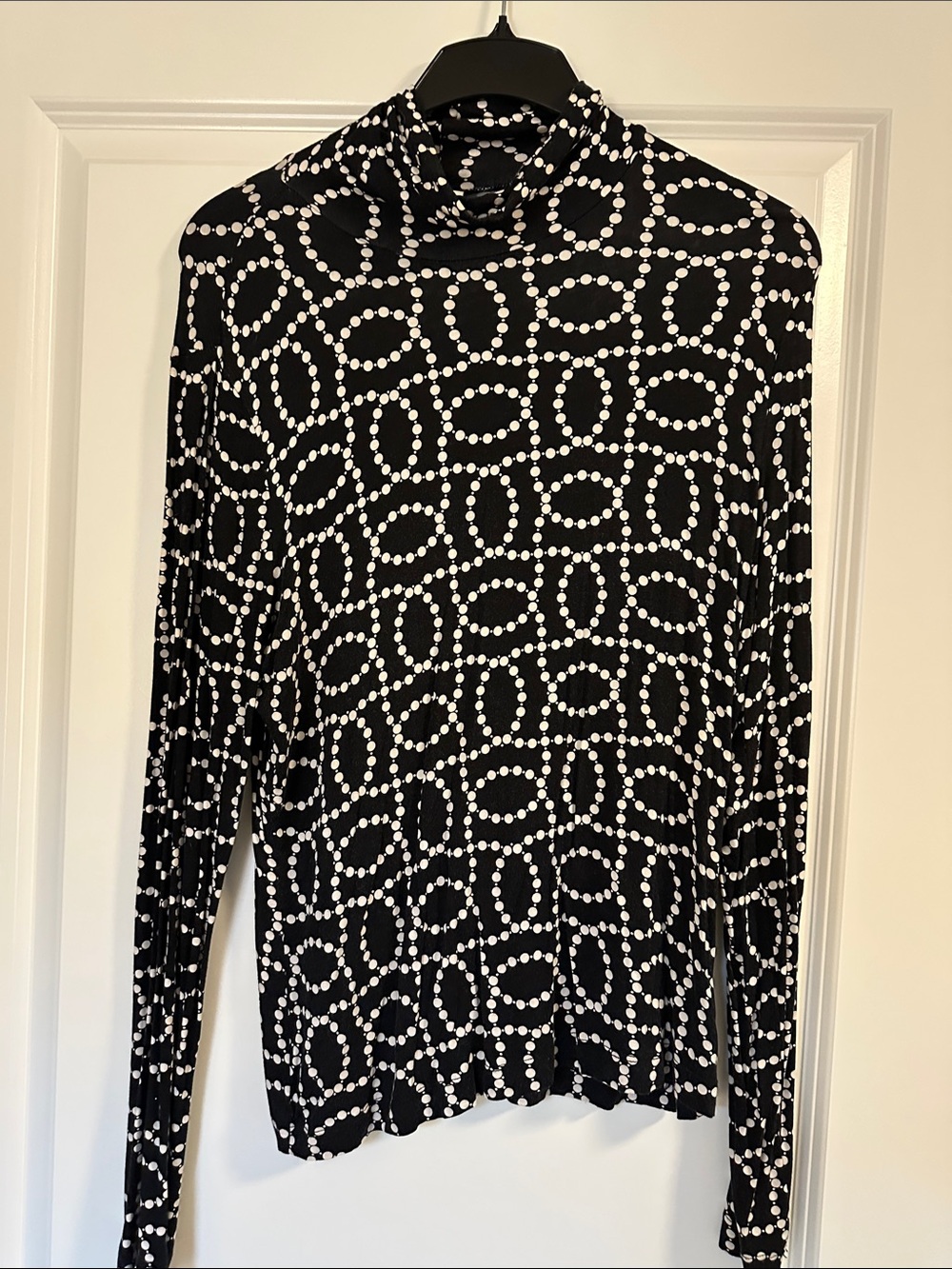 H&M Black Long-Sleeve Top with White Dot-Loop Pattern